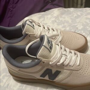 New Balance White and Gray Classic Sneakers